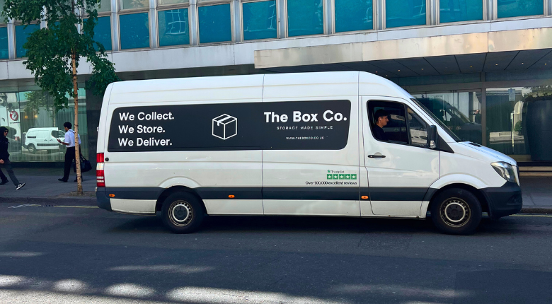Keli driving the van with The Box Co. logo